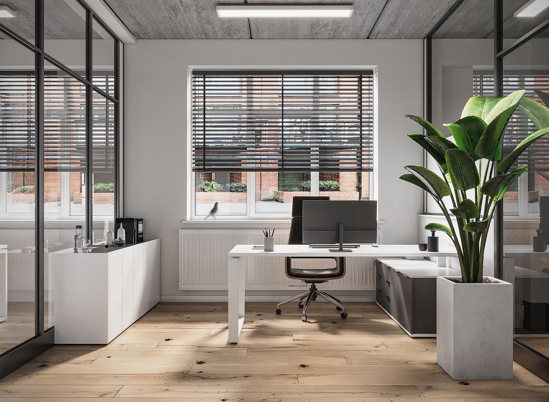 Completed office fit-out – open-plan workspace with glass partitions and oak floor